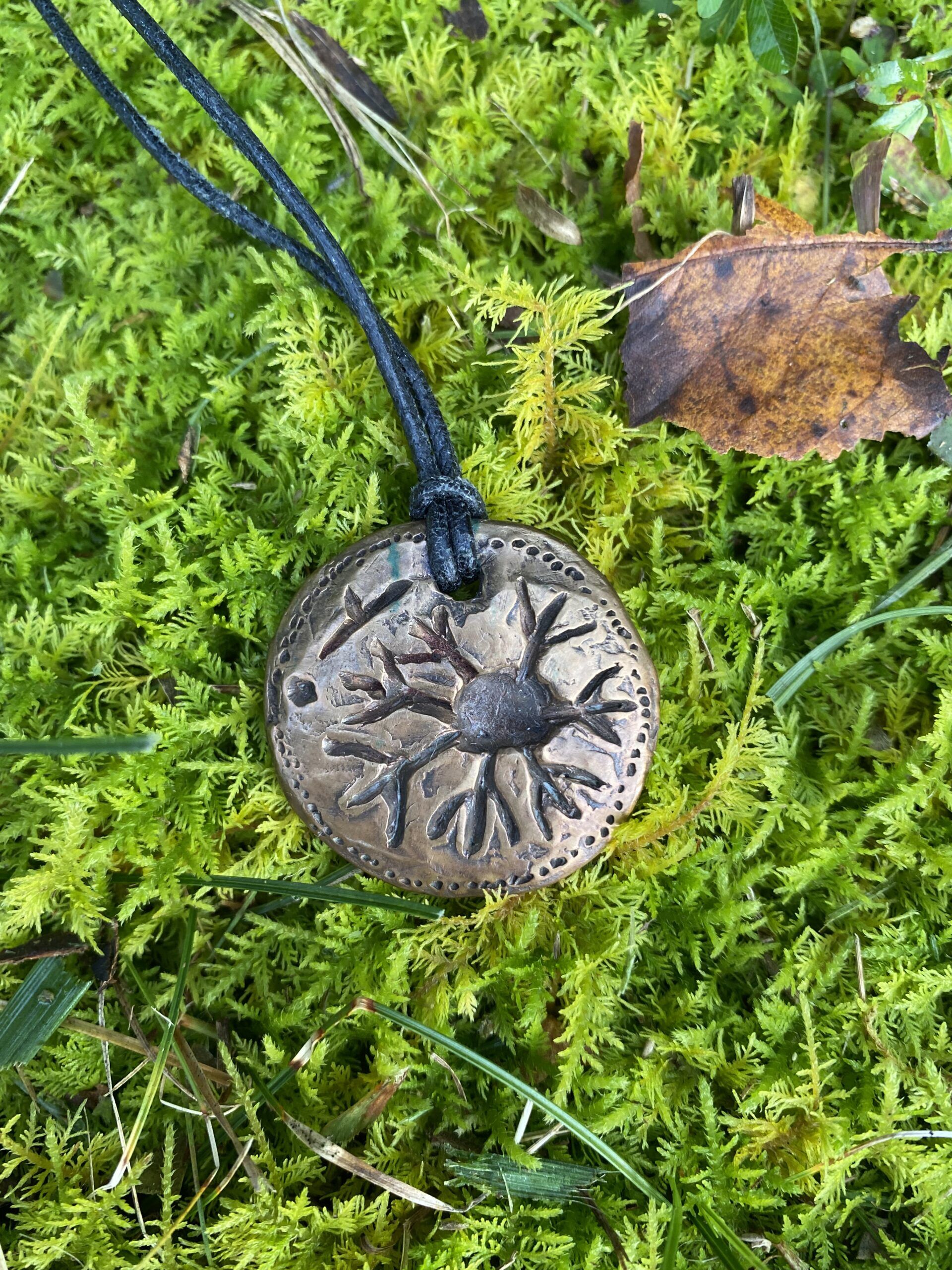 Petroglyph Bronze Pendants